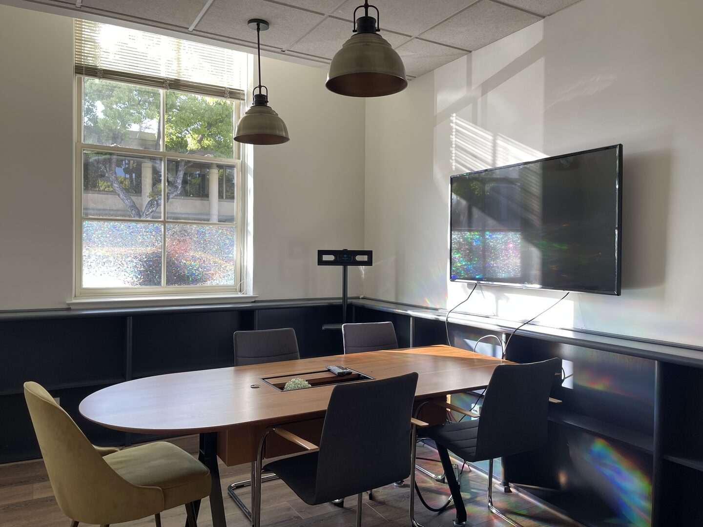 Conference room with pendant lighting