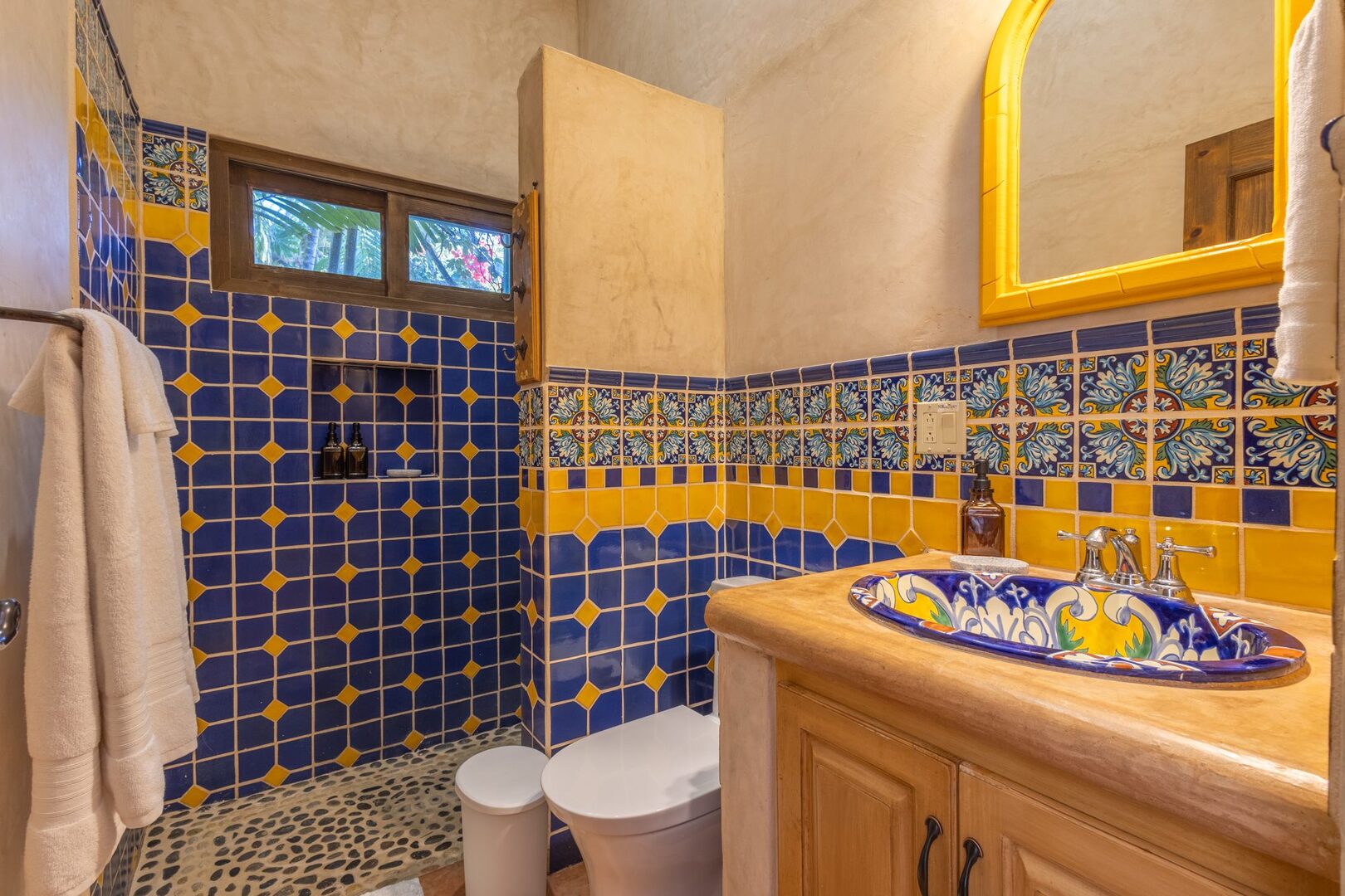 Bathroom with blue and yellow Talavera tile