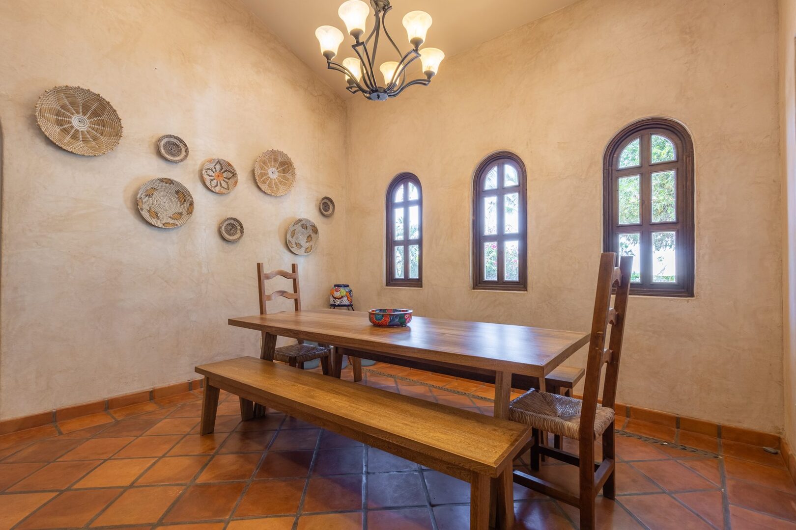 Dining room with handwoven wall baskets